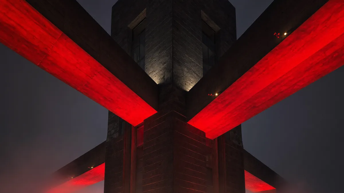 Three elevated skywalks from different directions converging into one central tower.